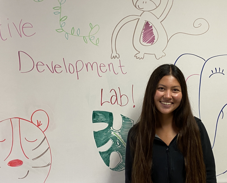 Giselle Ballew in front of white board