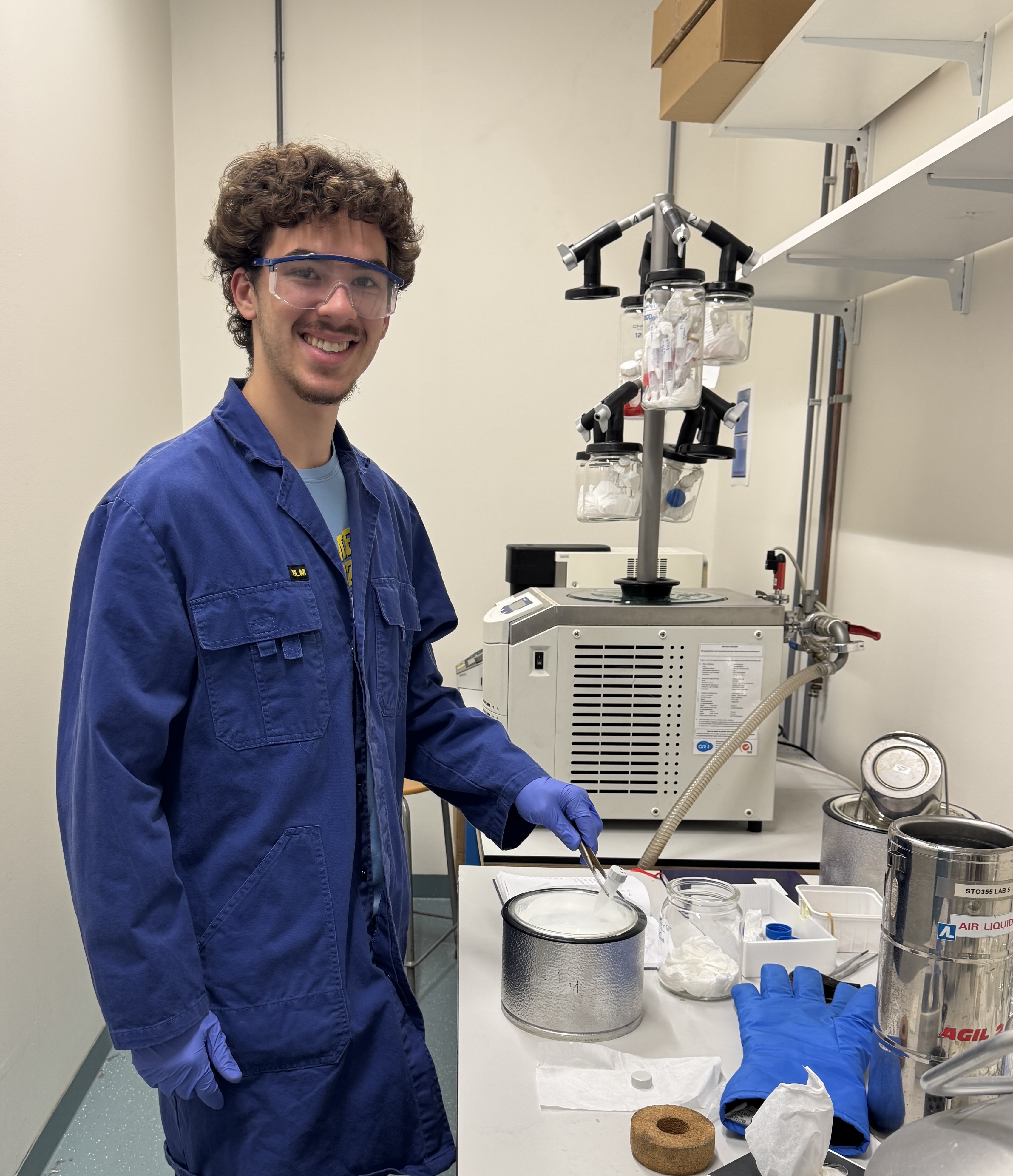 David standing next to lab instrumentation.