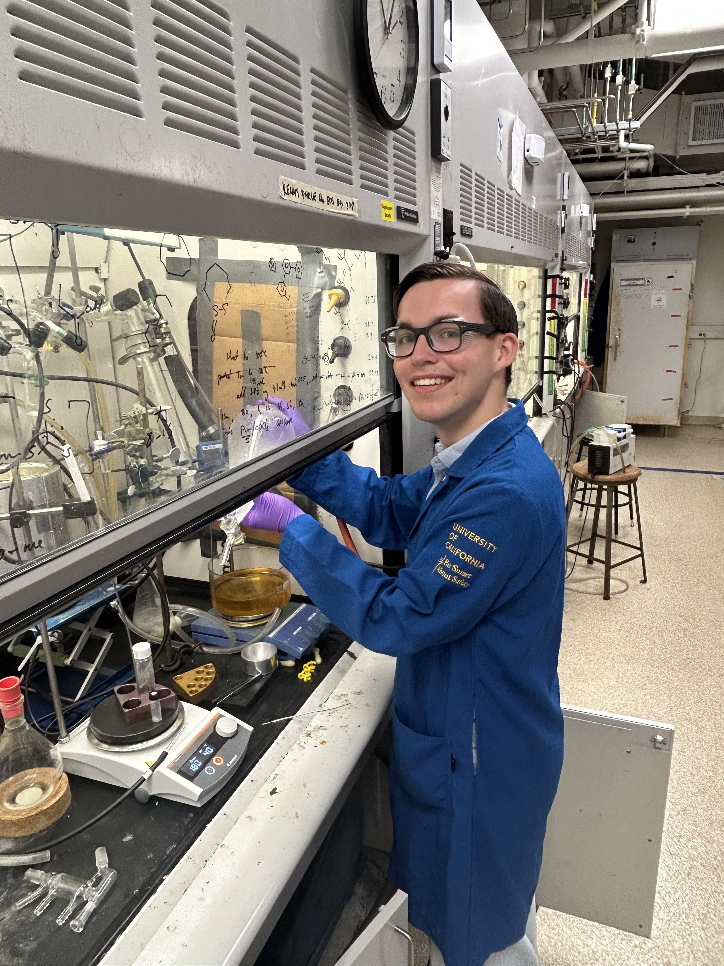 Guus standing with lab instrumentation