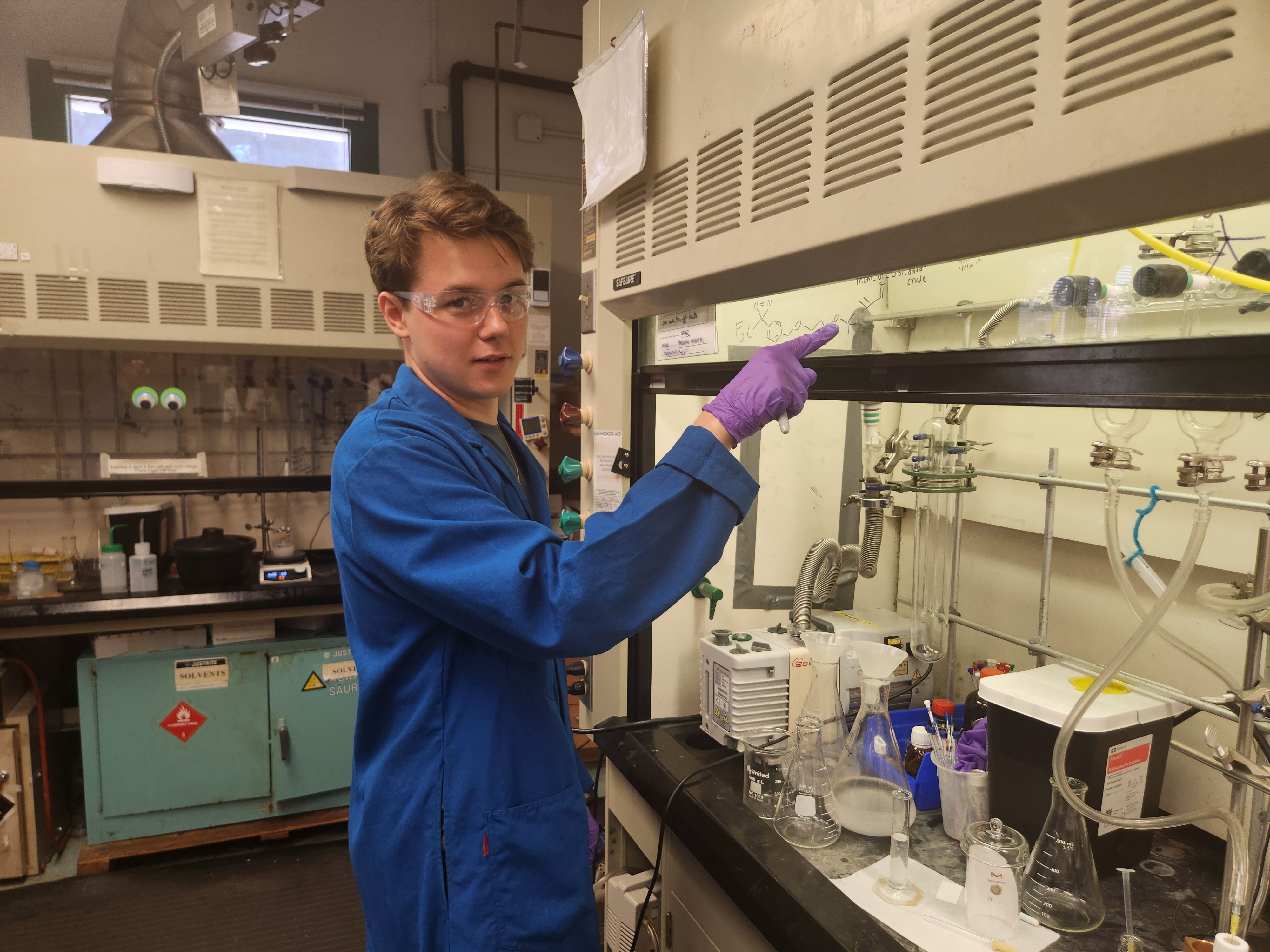 Hugo standing with lab instrumentation